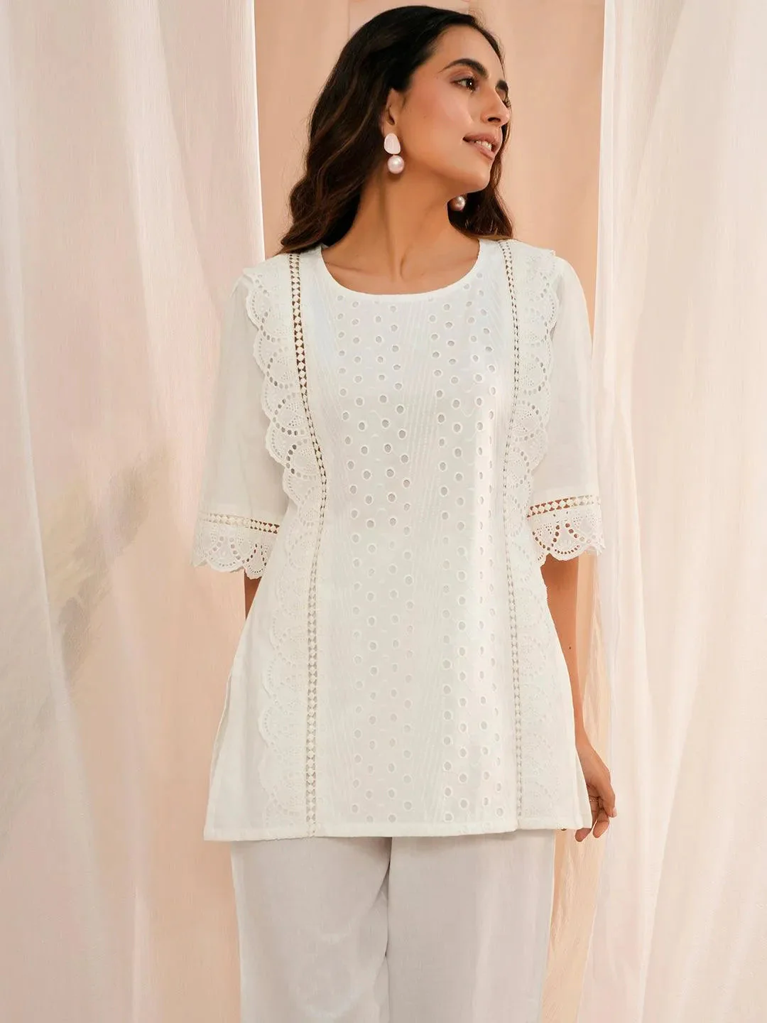 1_f41131e5-9bb7-4243-b63b-ae88268761c8.webp White Embroidered Cotton Straight Kurti - Image 1