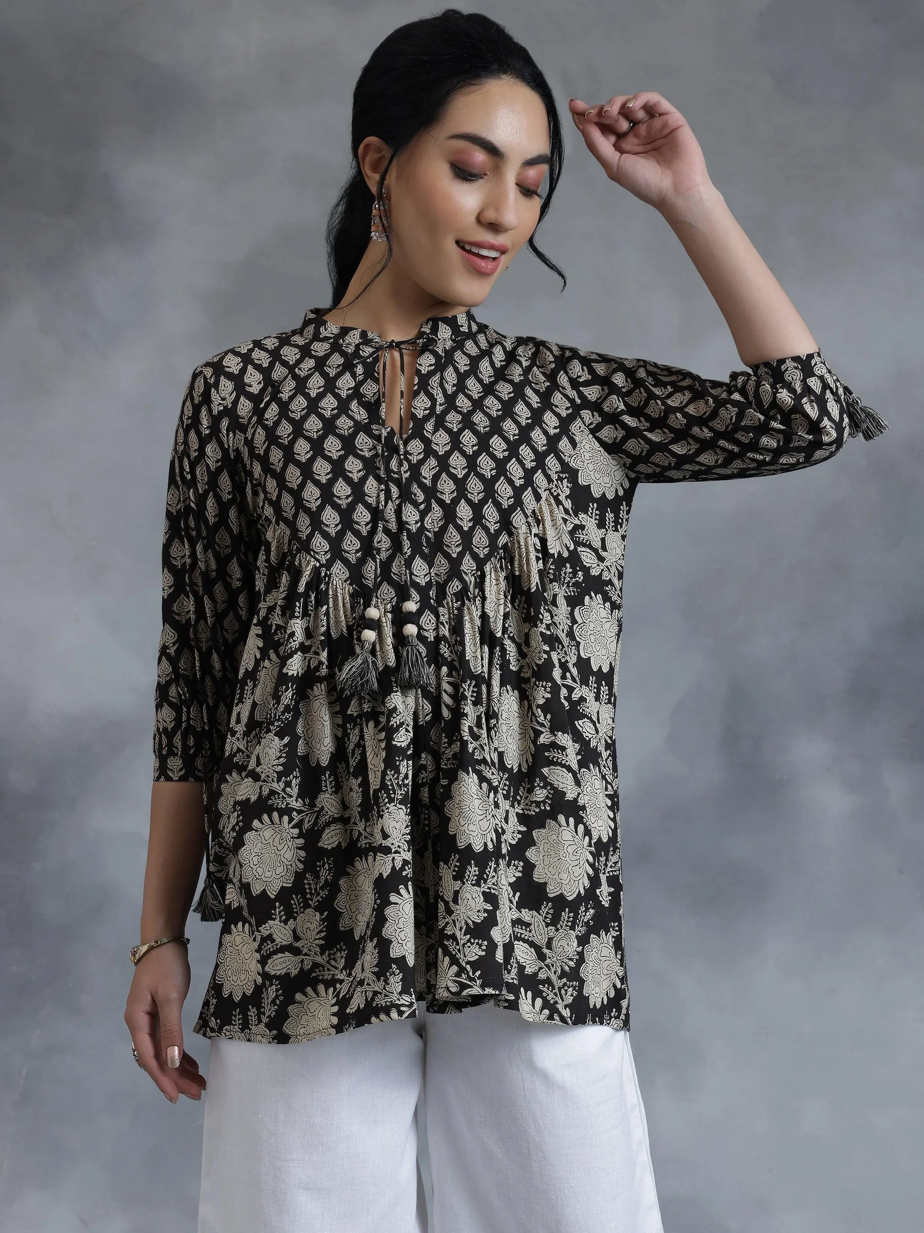 29067_6_1e65a936-d62c-42cc-85ce-aa7a931a4bd9.webp Black Printed Cotton A-Line Kurti - Image 1